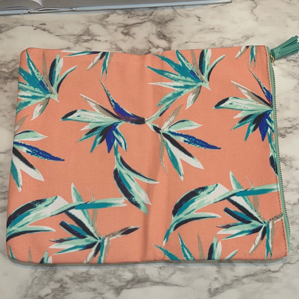 Rachel Pally foldable and reversible leather clutch with tropical print